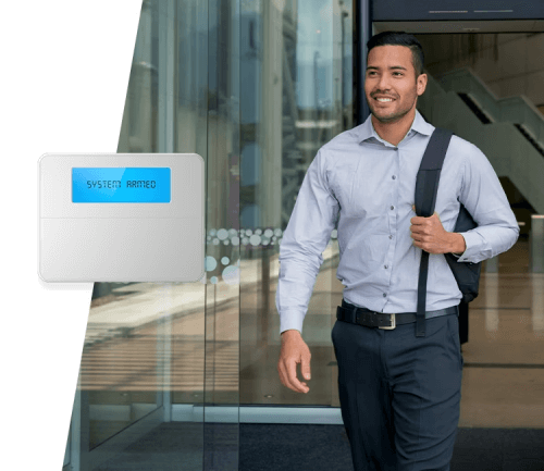 business man walking alarm system